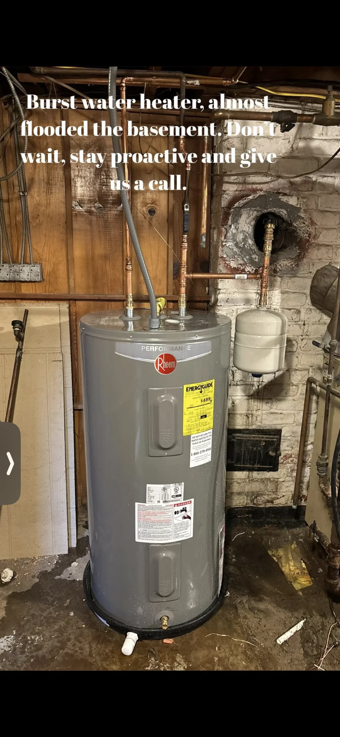 Gray Rheem Performance water heater with copper connections and expansion tank in basement